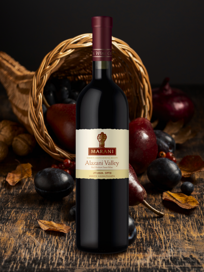 Marani Alazani Valley 2018 red wine bottle with fruits and basket