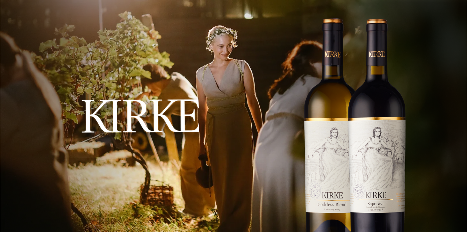 Shilda Kirke wine advertisement with vineyard and women in traditional dress in the background