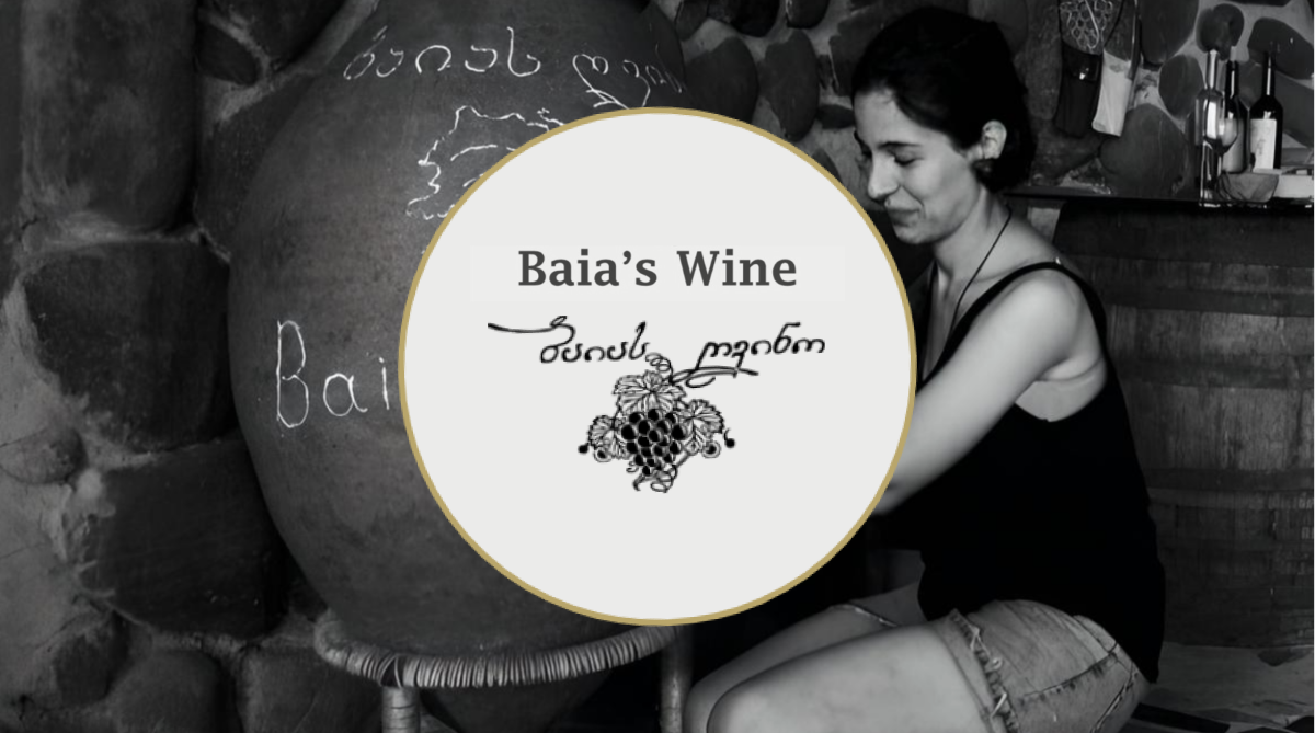 Baia's Winery logo with the founder in the background