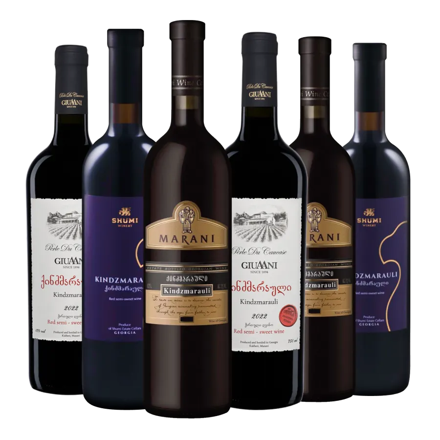 A collection of bottles of Kindzmarauli wine from Giuaani, Shumi and Marani wineries